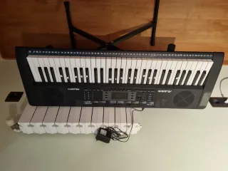 Piano,teclado Alesis Malody 61 con soporte