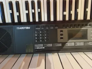 Piano,teclado Alesis Malody 61 con soporte