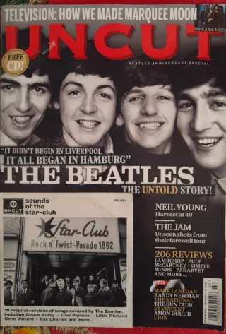 Uncut en inglés extenso artículo the Beatles y CD