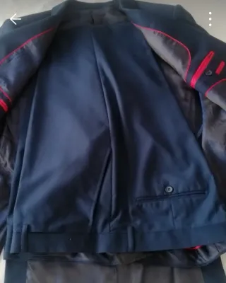 Traje de chaqueta y pantalón azul