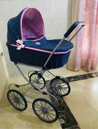 Carro de muñecas azul y rosa
