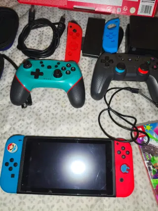Nintendo Switch + Accesorios y Juegos