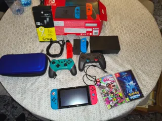 Nintendo Switch + Accesorios y Juegos