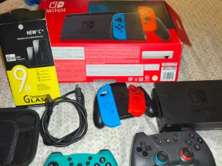 Nintendo Switch + Accesorios y Juegos