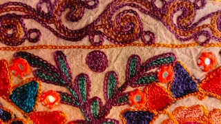 Bolso cartera bordado con abalorios