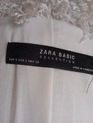 Chaqueta Zara efecto plumitas gris perla