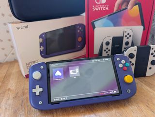 Nintendo Switch OLED + Nitro Deck + Juegos