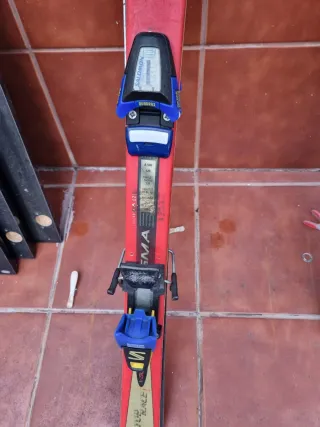 Esquís Rossignol con botas y bastones