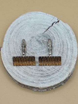 Gemelos de Plata Dorada