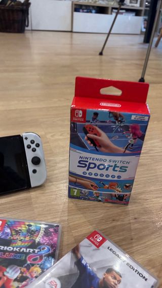 Nintendo Switch OLED + Juegos y Funda