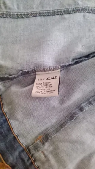 Cazadora vaquera con pedrería y flecos