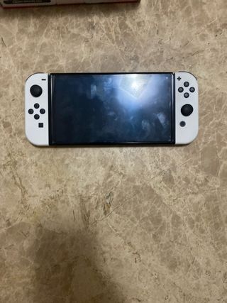 Nintendo Switch OLED + 2 Juegos