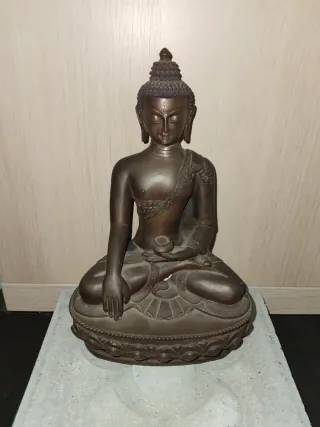 Buda de bronce sentado en loto