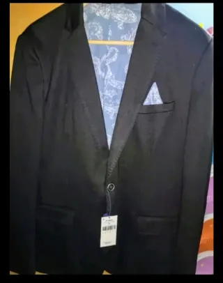Chaqueta de traje negra talla L a estrenar.