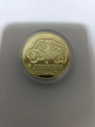 Réplica Moneda Jurassic Park Dorada