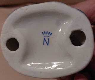 Statuina decorativa in porcellana