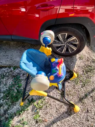 Columpio-trona para bebé con centro de actividades