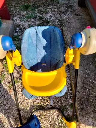 Columpio-trona para bebé con centro de actividades