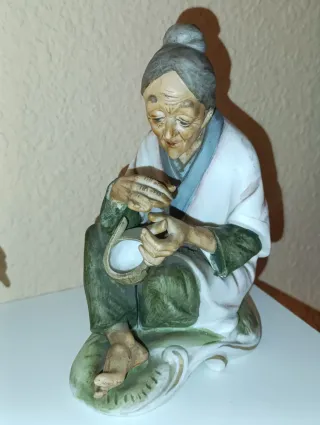 Lote dos figuras cerámica antigua pareja ancianos.
