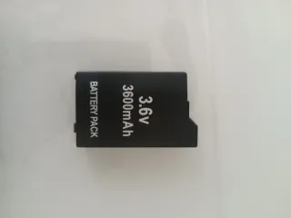 PSP Slim 2004 Nero + 5 giochi