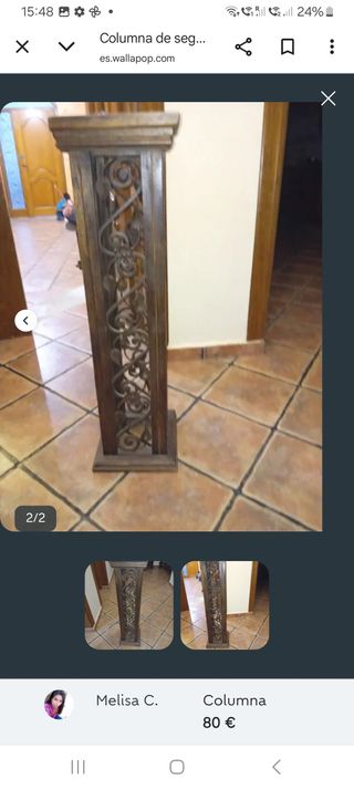 Columna de madera con detalles metálicos