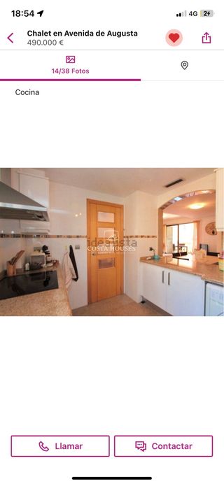 Muebles de cocina blancos y piedra