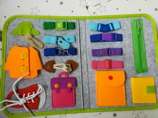 Maletín sensorial con broches NUEVO