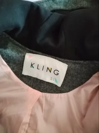 Abrigo gris Kling con forro rosa