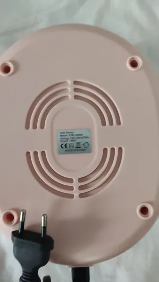 Calentador de cera rosa