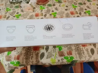 Secador de pelo gris con accesorios