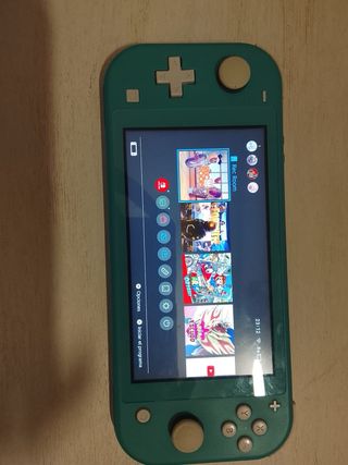 Nintendo Switch Lite Azul/Verde muy bien cuidada