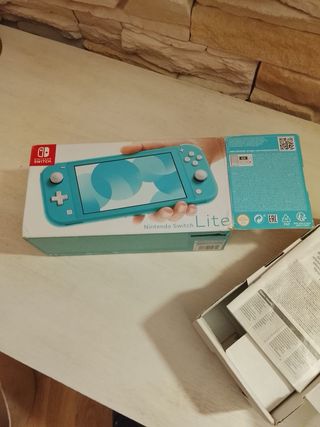 Nintendo Switch Lite Azul/Verde muy bien cuidada