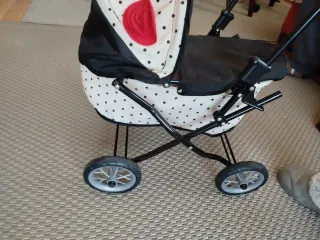 Carro de muñecas con lunares