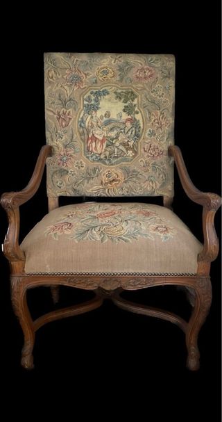 Sillón antiguo tapizado floral