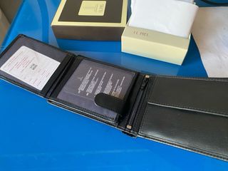 Cartera de piel negra de la marca JL Piel