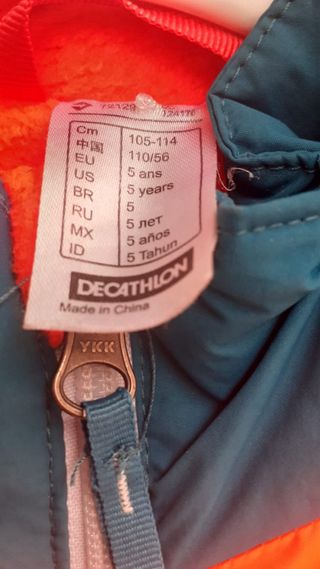 Mono de esquí infantil naranja y azul