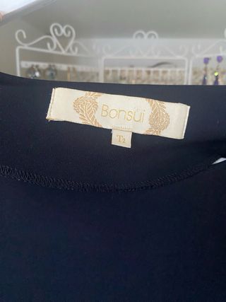 Top Bonsui negro con flecos