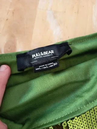 Falda lentejuelas verde con flecos