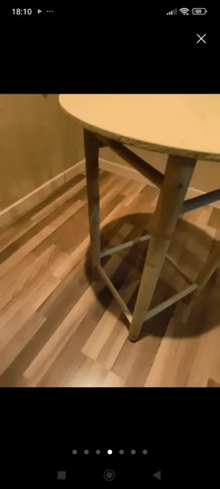 Mesa camilla redonda con tapetes