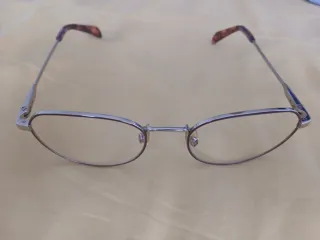 Gafas Tous doradas y marrones para niña