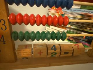 Juguete didáctico ábaco reloj operaciones madera