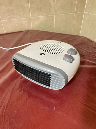 Calefactor eléctrico blanco y gris