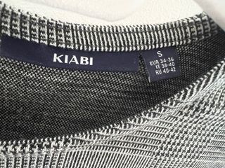 Camiseta de vestir, de chica. Talla S