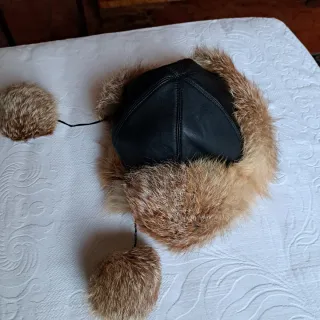 Berretto con paraorecchie in marmotta