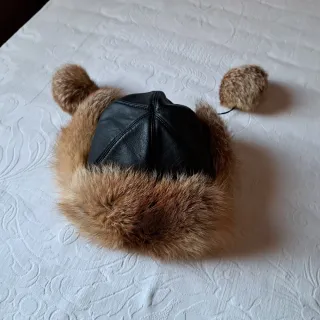 Berretto con paraorecchie in marmotta
