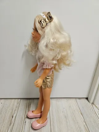 Muñeca Nancy pelo rubio y ropa rosa