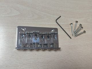Puente fijo para guitarra eléctrica cromado