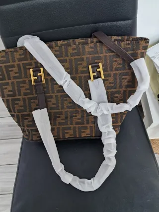 Bolso marron y dorado