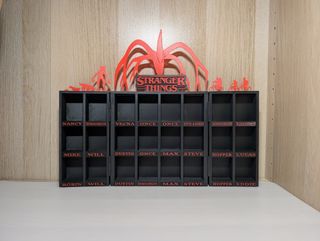 Expositor Stranger Things GLOW Rojo