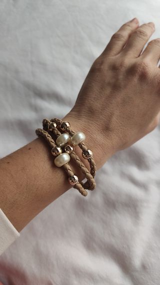 Pulsera Zara trenzada con perlas y dorado